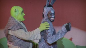 scene from Shrek The Musical with Shrek and Donkey